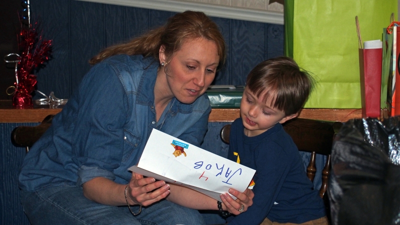 Mom reading the card