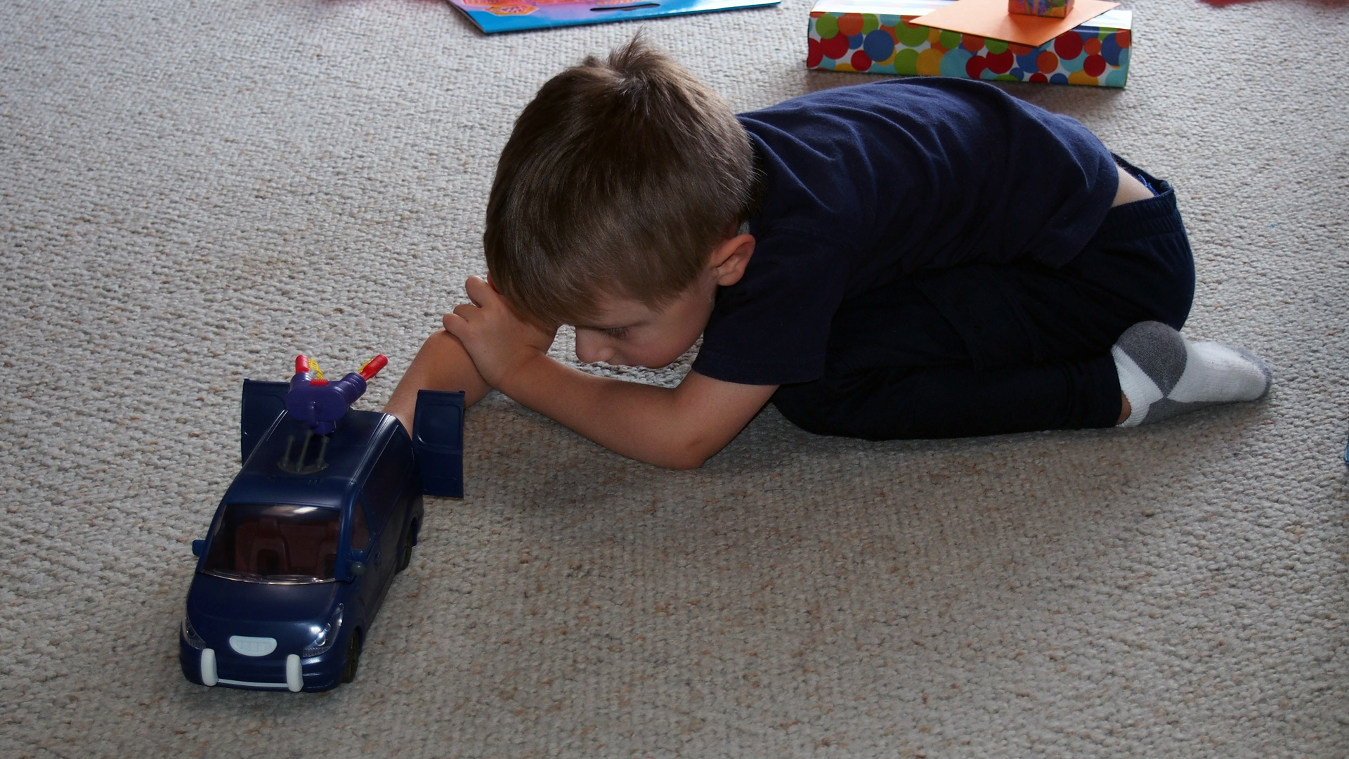 Playing With One Of His Gifts