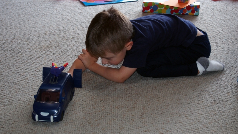 Playing With One Of His Gifts